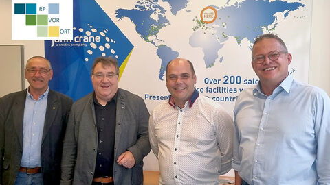 RP Weinmeister mit drei weiteren Personen von einer Medienwand.